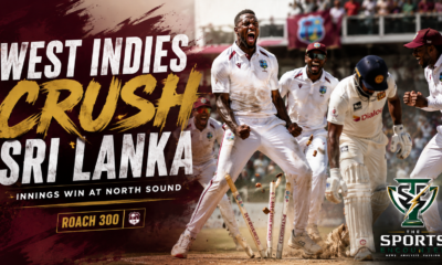 West Indies cricketers celebrate a dominant innings victory over Sri Lanka at North Sound, with key match details highlighting Amir Jangoo’s 233, Roston Chase’s 194, and Kemar Roach’s 300th Test wicket.