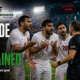Iranian players in white kits protest an offside decision as the referee and assistant referee signal the call during the Iran vs Egypt World Cup 2026 match.