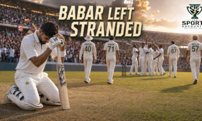 Dejected Babar Azam kneels beside his bat as Pakistan’s players walk away and West Indies celebrate their first Test victory with jubilant home fans.