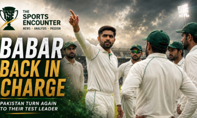 Babar Azam directs Pakistan teammates on the field in a Test cricket huddle after returning as Pakistan Test captain for the West Indies series.