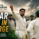 Babar Azam directs Pakistan teammates on the field in a Test cricket huddle after returning as Pakistan Test captain for the West Indies series.