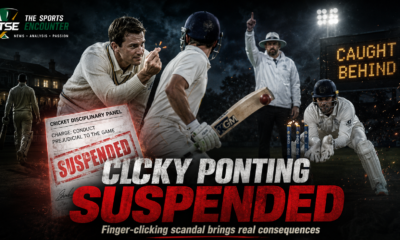A cricketer makes a suspicious finger-clicking gesture near the batter as an umpire signals a dismissal, illustrating the “Clicky Ponting” scandal and subsequent suspension.