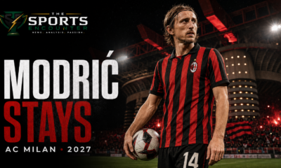 Luka Modrić stands with a football on the San Siro pitch in AC Milan colors after extending his contract through June 2027.