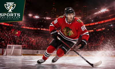 Patrick Kane skates across the ice in Chicago Blackhawks colors during his emotional return, with The Sports Encounter logo.