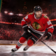 Patrick Kane skates across the ice in Chicago Blackhawks colors during his emotional return, with The Sports Encounter logo.