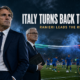 Cinematic VFX artwork of two veteran Italian coaches overseeing national-team training in a floodlit stadium, representing Roberto Mancini’s return and Claudio Ranieri’s role in rebuilding Italy.