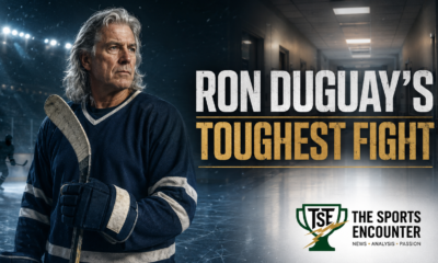 Cinematic VFX artwork of a veteran hockey player standing between an ice arena and a hospital corridor, reflecting former Rangers star Ron Duguay’s hospitalization and ongoing battle with Stage 4 colon cancer.