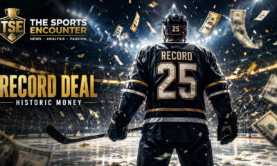 Back view of an NHL player standing on the ice as dollar bills rain down around him in a dramatic record-deal themed graphic.
