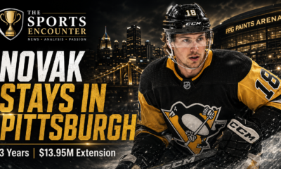 Tommy Novak skates in a Pittsburgh Penguins uniform outside PPG Paints Arena, highlighting his three-year, $13.95 million contract extension through the 2029-30 NHL season.