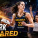 Caitlin Clark drives the ball for the Indiana Fever as a referee signals during the disputed call later rescinded by the WNBA, with “Clark Cleared” highlighting her avoided suspension.
