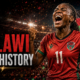 A jubilant Malawi women’s footballer celebrates under stadium lights as Malawi make history by qualifying for their first FIFA Women’s World Cup after beating Ghana at WAFCON 2026.