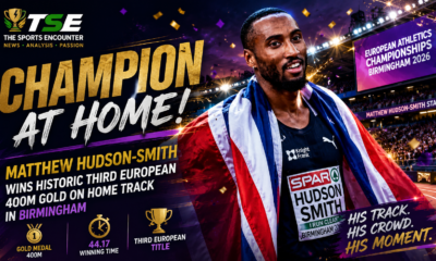 Matthew Hudson-Smith celebrates winning his third European 400m title in 44.17 seconds at the 2026 European Athletics Championships in Birmingham, draped in the Union Jack on his home track at Alexander Stadium.