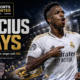 Cinematic Vinícius Júnior contract graphic showing the Real Madrid winger celebrating in a white kit at a floodlit Bernabéu-style stadium, alongside a glowing new contract through 2032, transfer-rumor imagery linking him with Arsenal, the headline “Vinícius Stays,” and The Sports Encounter logo.