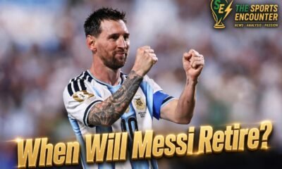 Lionel Messi raises both index fingers toward the sky in Argentina’s No. 10 jersey during a match, illustrating the uncertainty around when the 39-year-old legend will retire from international football.