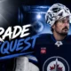 Connor Hellebuyck in Winnipeg Jets colors as his trade request raises major questions about the franchise’s future.