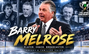 Barry Melrose speaking rinkside during a hockey broadcast, remembered after his death at age 70.