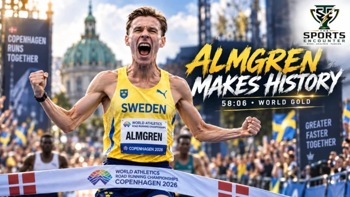 Andreas Almgren celebrates after winning the 2026 World Athletics Road Running Championships men’s half marathon in Copenhagen in a European-record 58:06.