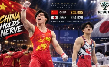 Zhang Boheng celebrates with China’s men’s gymnastics team after holding off Daiki Hashimoto and Japan to win the 2026 Asian Games team gold in Nagoya.