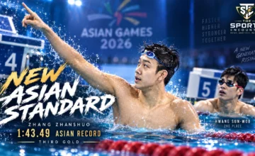 China’s Zhang Zhanshuo celebrates after swimming an Asian-record 1:43.49 to beat Hwang Sun-woo and win the men’s 200m freestyle at the 2026 Asian Games.