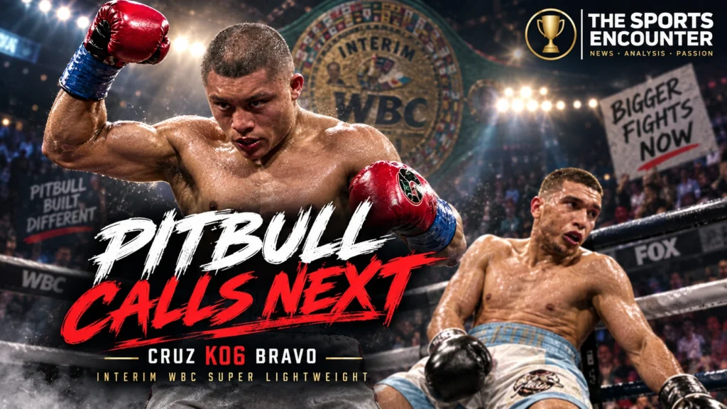 Isaac Pitbull Cruz celebrates after knocking out Nestor Bravo in the sixth round to retain his interim WBC super lightweight title in San Diego.